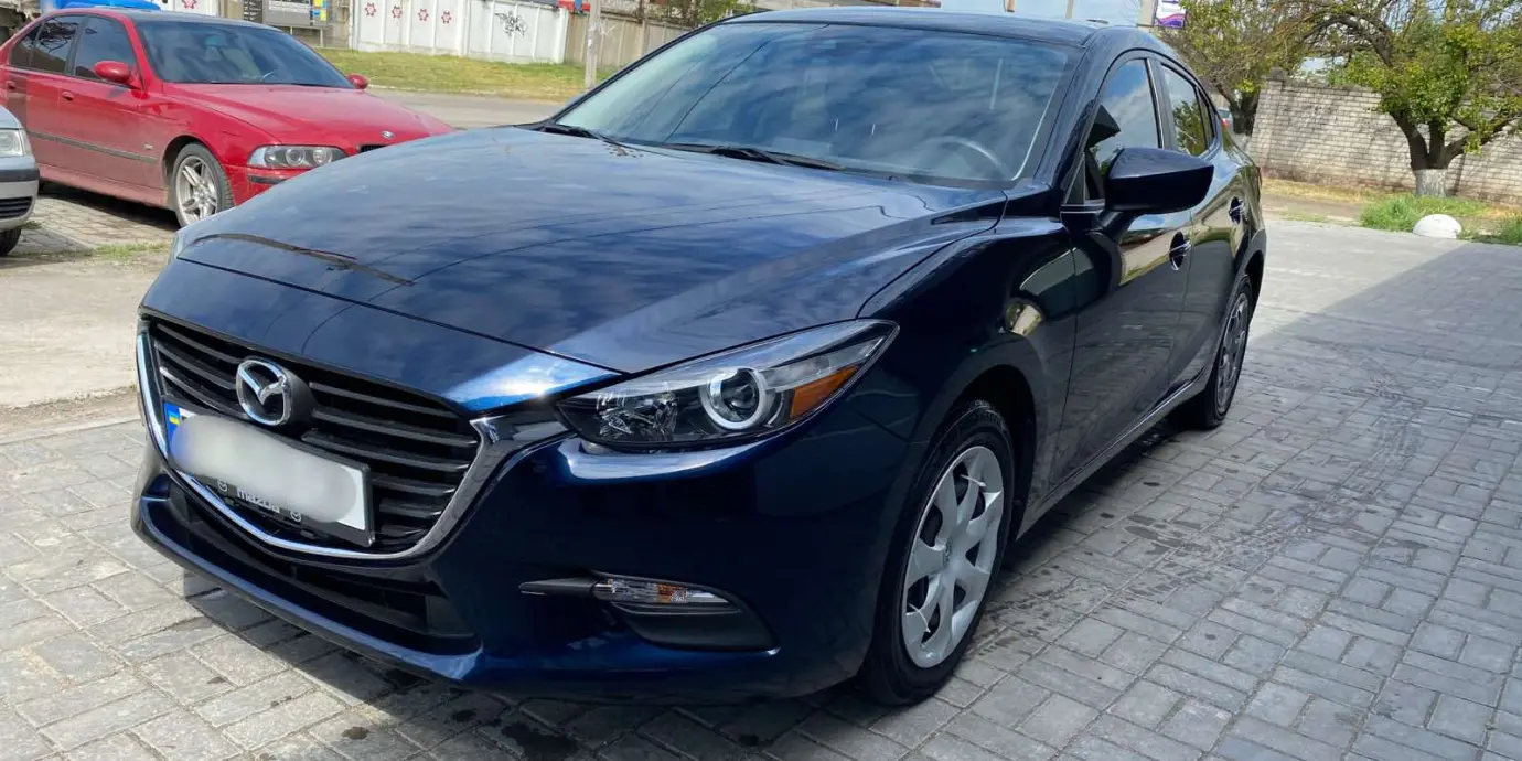 Фото автомобіля Mazda 3 - 1