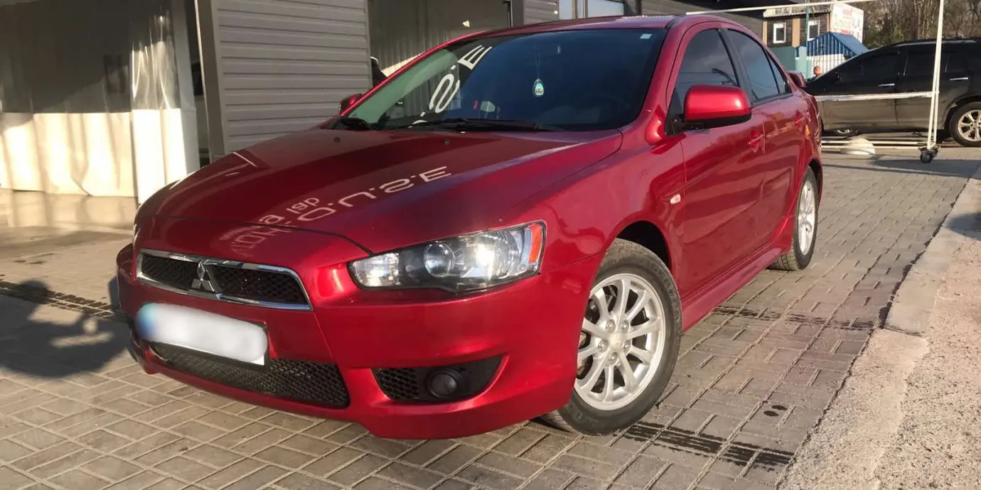 Фото автомобіля Mitsubishi Lancer - 1